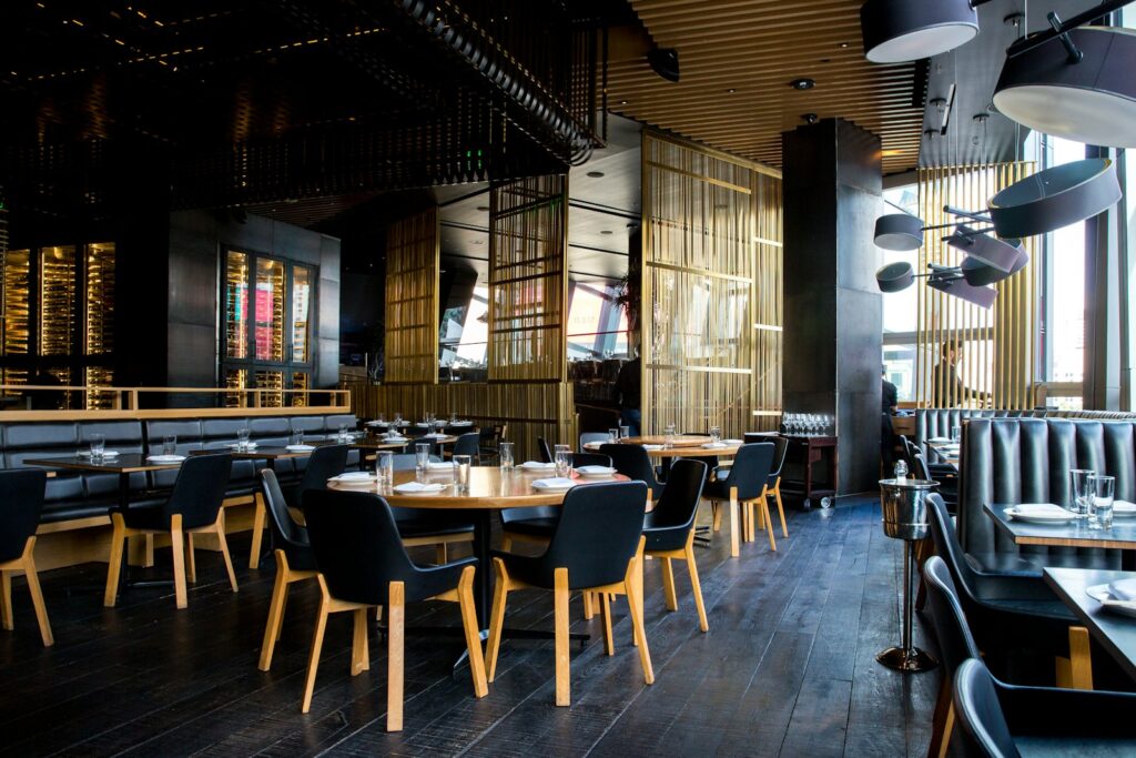 Warmly lit restaurant dining room promoted through social media marketing